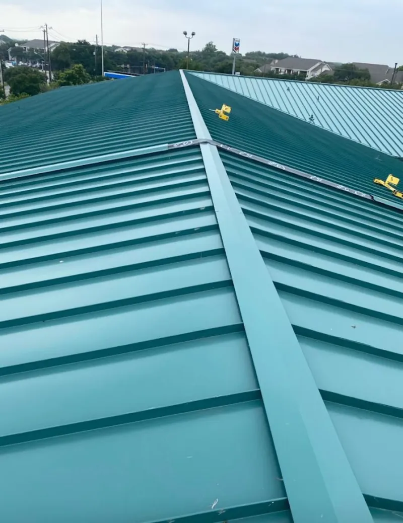 Green commercial metal roof ridge and valley for Metal Roof Repair in Bexley